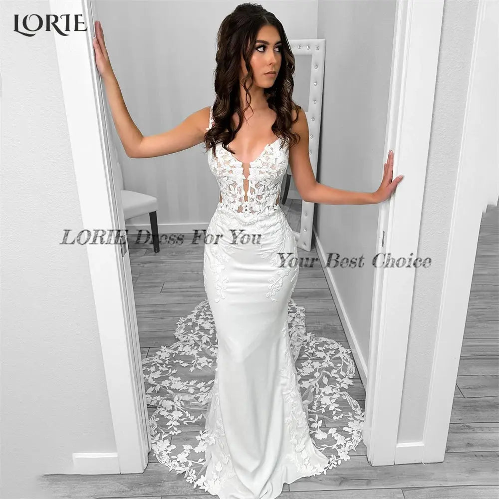 LORIE Vintage Lace Mermaid Wedding Dresses Deep V-Neck Appliques BrushSPECIFICATIONSBrand Name: LORIEStyle: ClassicNeckline: V-NECKSleeve Length(cm): sleevelessTrain: Sweep/ Brush TrainOrigin: Mainland ChinaCN: JiangsuDresses Length: FJohnny TirakJohnny Tirak-Neck Appliques Brush Train Bodycon Bridal Gowns Spaghetti Straps Bride Dress