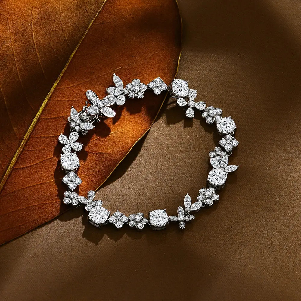 ATTAGEMS Luxury D VVS1 Color Real 925 Sterling Silver Moissanite BraceSPECIFICATIONSBrand Name: ATTAGEMSBracelets Type: Charm BraceletsMain Stone: MoissaniteCertificate Type: GTCOrigin: Mainland ChinaCertificate: YESItem Weight: 11.3 GJohnny TirakJohnny TirakVVS1 Color Real 925 Sterling Silver Moissanite Bracelets