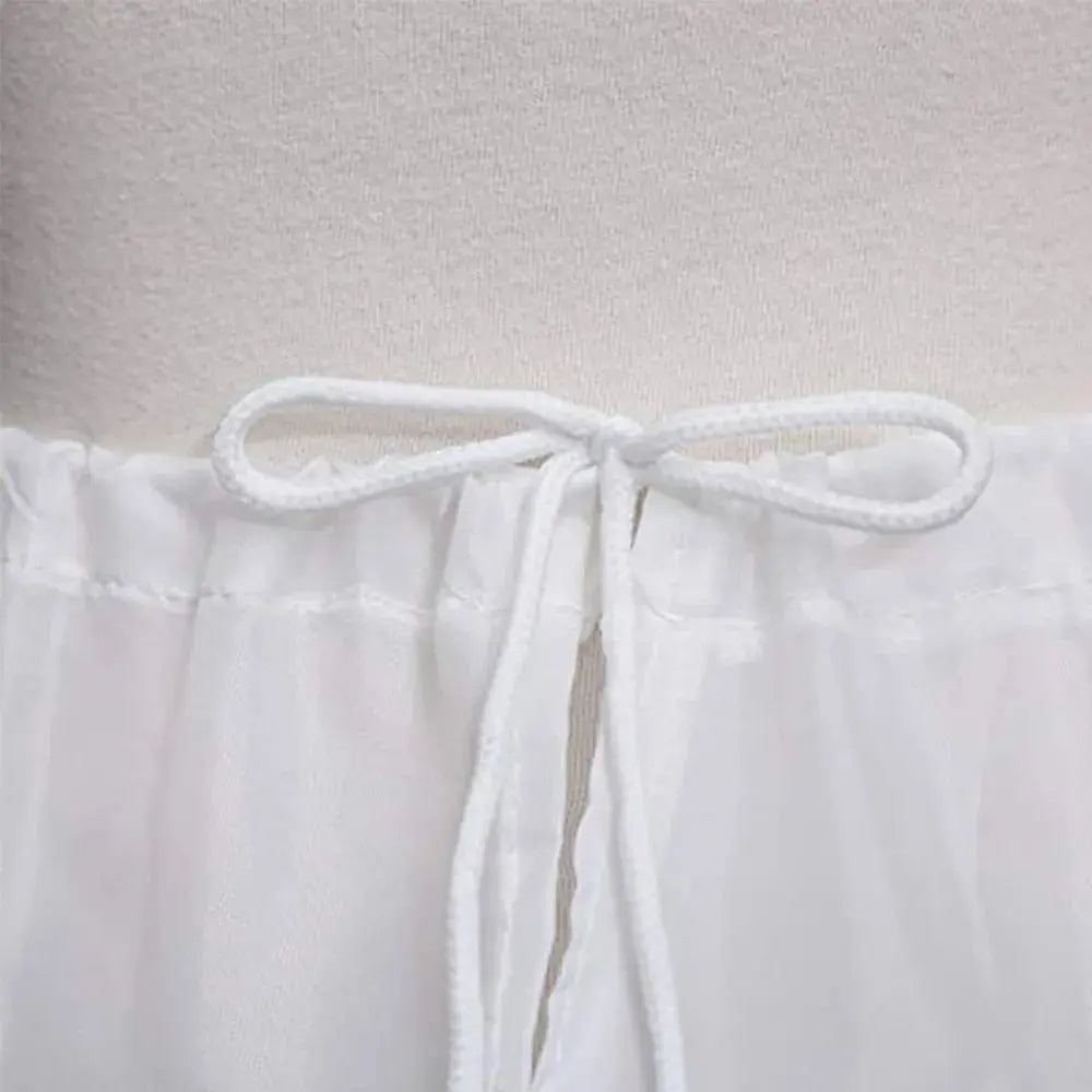 2023 White Children kids Petticoat A-Line 3 Hoops One Layer Kids CrinoSPECIFICATIONSBrand Name: NoEnName_NullMaterial: POLYESTEROrigin: Mainland ChinaCN: JiangsuTechnics: RUFFLEItem Type: petticoatDepartment Name: ChildrenChoice: yesJohnny TirakJohnny TirakLayer Kids Crinoline Lace Trim Flower Girl Dress Underskirt Elastic Waist